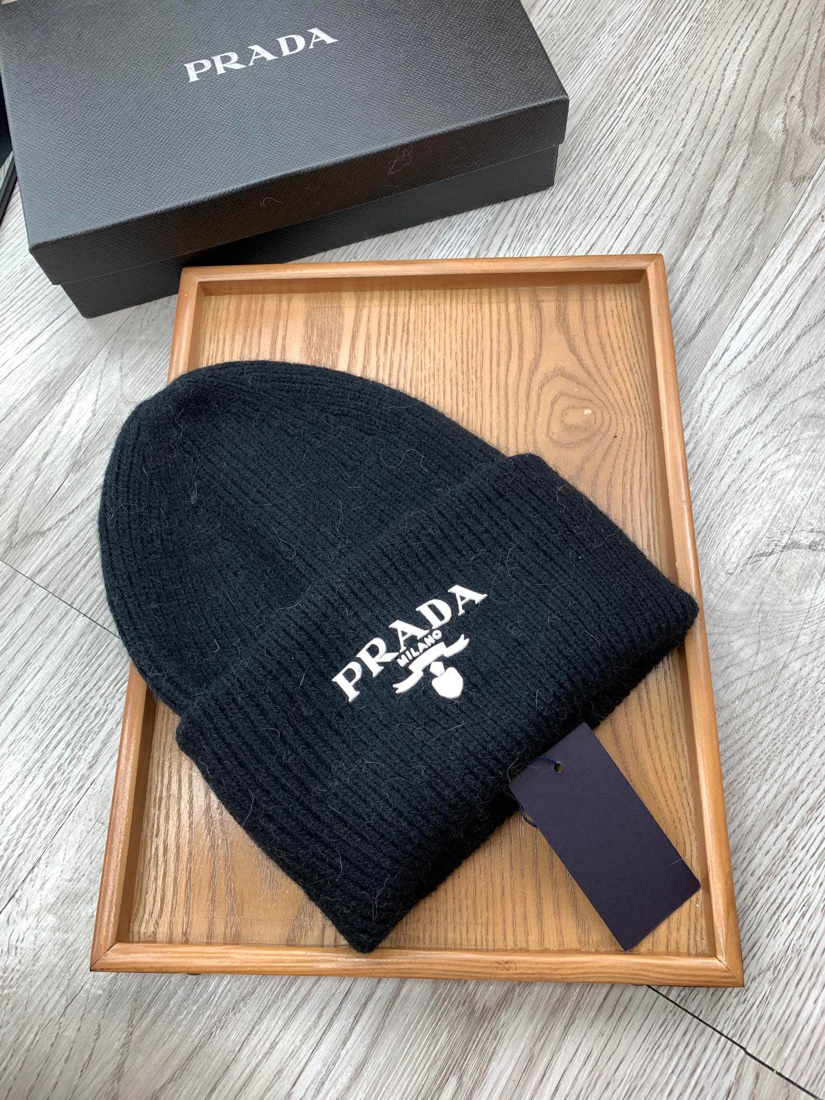 PRADA BEANIE HAT IN BLACK WOOL 108753