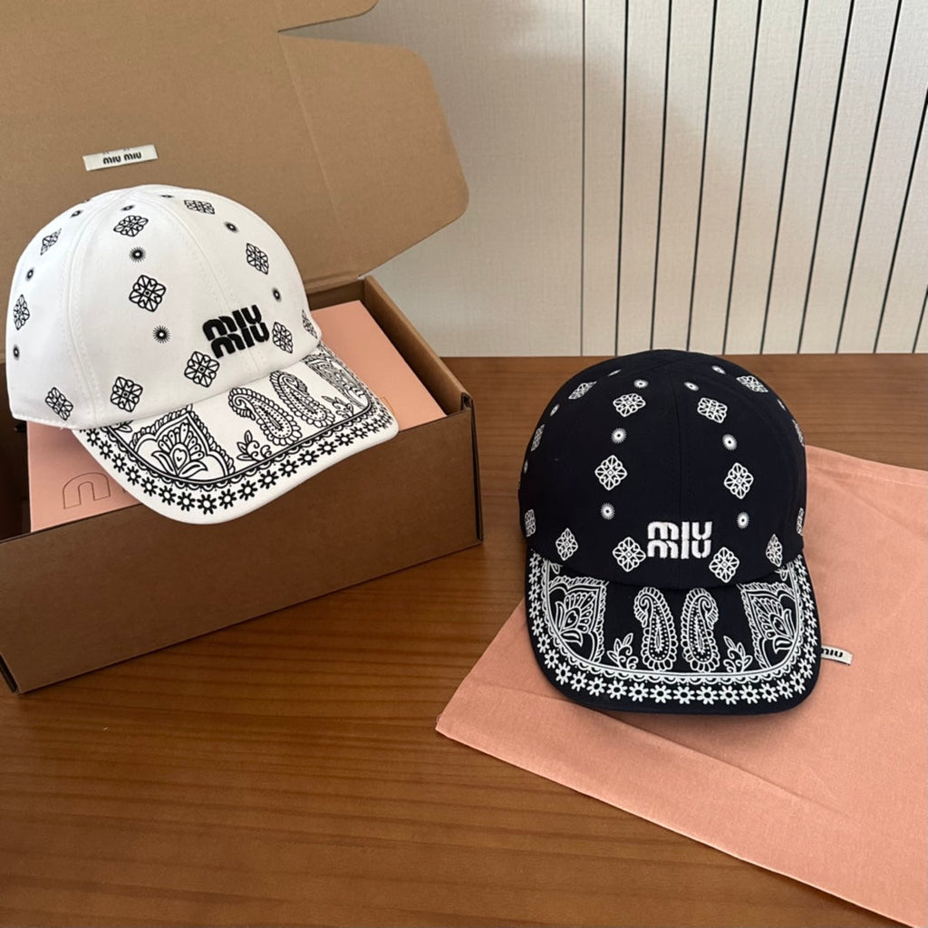 MIU MIU MM BASEBALL CAP IN BLACK WITH WHITE EMBROIDERED PATTERN