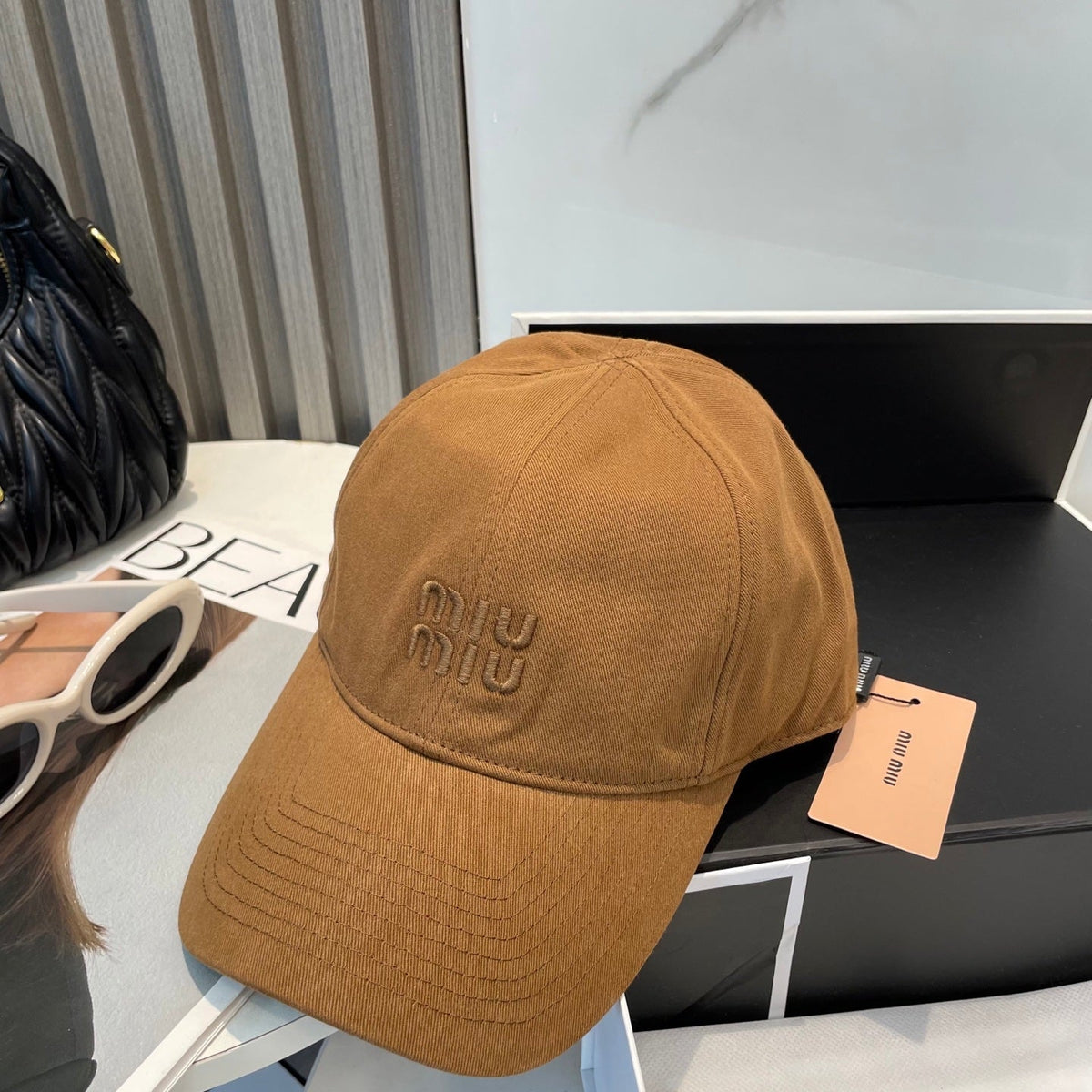 MIU MIU MM BASEBALL CAP IN BURNT ORANGE FABRIC BRAND EMBROIDERY