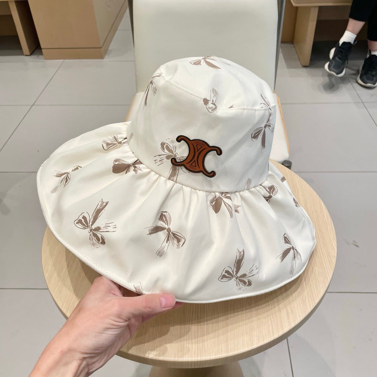 CELINE 25S BUCKET BOW HAT 733404 IN IVORY