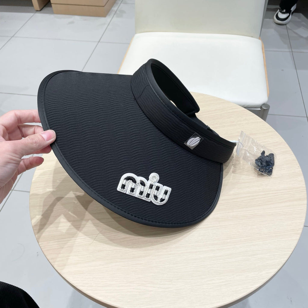 MIU MIU MM FASHION VISOR CAP IN BLACK AND WHITE WITH LOGO TEXT EMBROIDERY