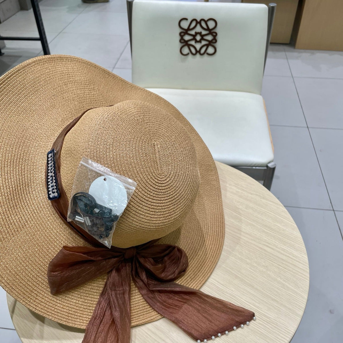 MIU MIU MM WIDE-BRIM BEACH HAT IN BEIGE WITH FABRIC BOW